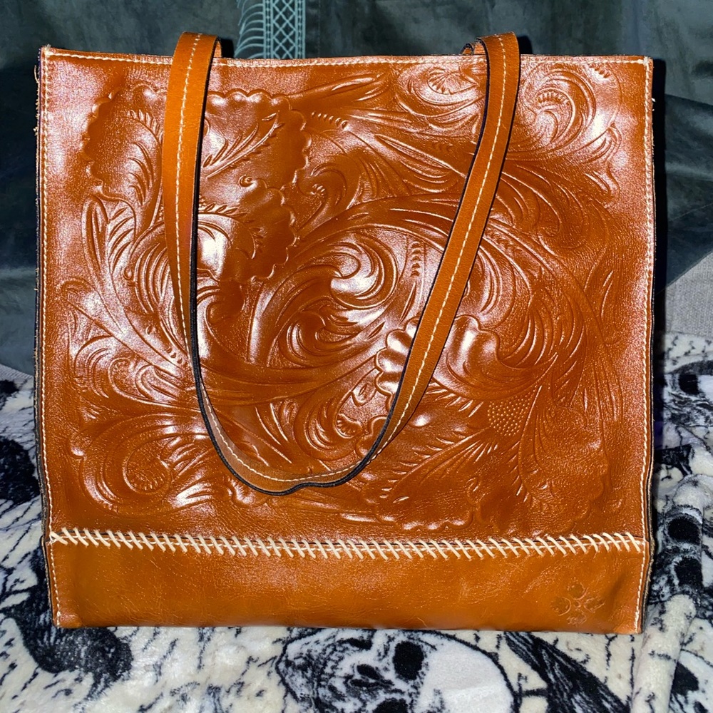 Genuine leather tote style bag by Praticia Nash